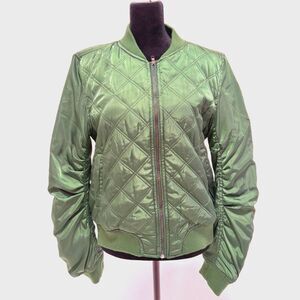 The Story	emerald green quilted bomber